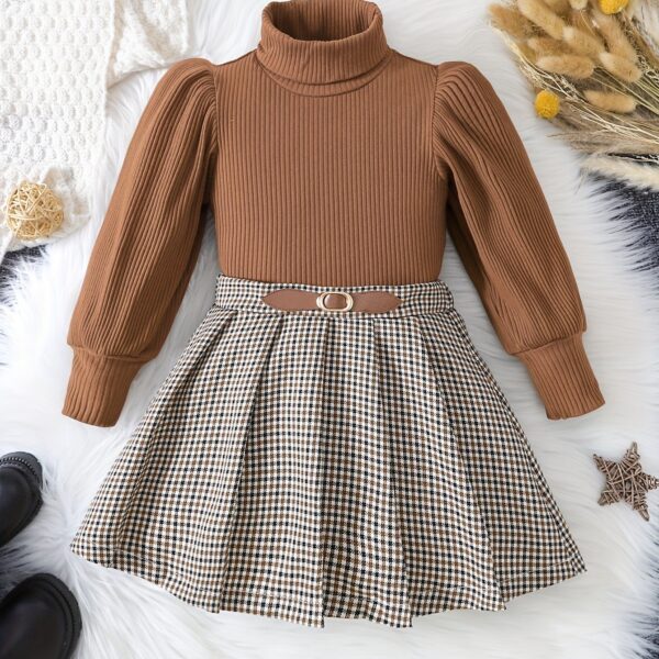 Adorable Newness toddler girl set featuring a cozy knit top and a chic houndstooth skirt, perfect for fall and winter.