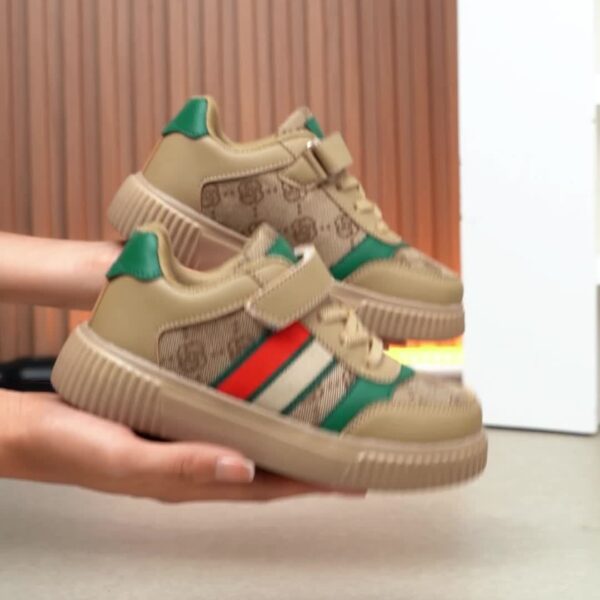 Stylish and vibrant color-block striped kids' sneakers by Newness. Lightweight and durable, perfect for everyday wear.