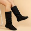 Newness Slouchy Mid Calf Boots Stylish boots perfect for any occasion Shown in color leather