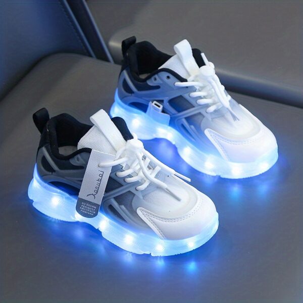 Kids' GUANGLAN Nova Glow Shoes lighting up at night, showcasing their lightweight and durable design. Perfect for nighttime play and adventures!
