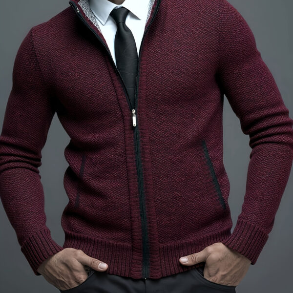 The Newness Apex Men's Knit Blazer: A stylish and comfortable knit blazer, perfect for any occasion. Model wearing the navy blue Apex blazer.