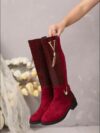 Newness Crimson V Chain Burgundy Knee Boots Elevate your style with these luxurious burgundy knee high boots featuring a striking V chain detail