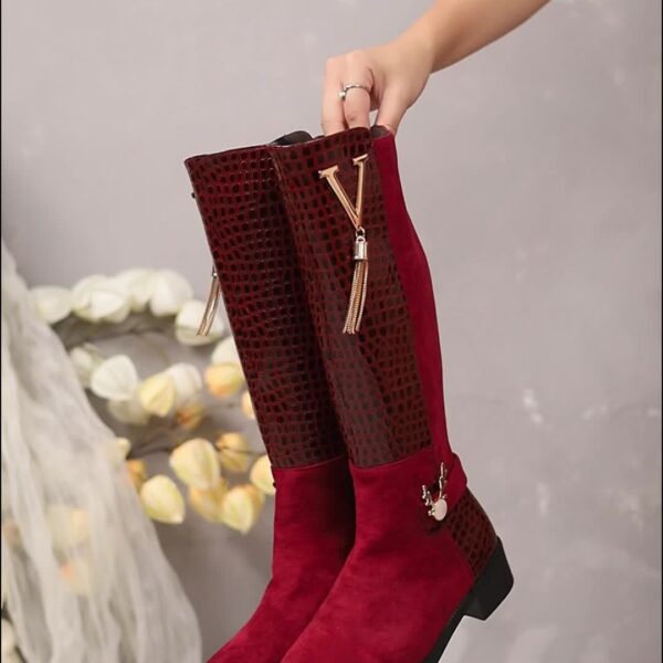Newness Crimson V-Chain Burgundy Knee Boots: Elevate your style with these luxurious burgundy knee-high boots, featuring a striking V-chain detail.