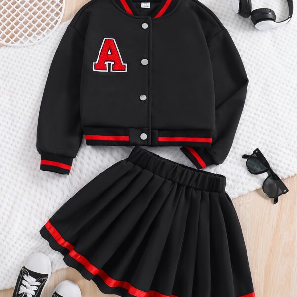 Stylish preppy varsity jacket and skirt set in navy and cream modeled on a student in a school setting
