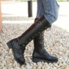 Newness Rebellious Spirit Buckle Knee Boots Elevate your style with these edgy knee high boots featuring a striking buckle detail Perfect for adding a touch of rebellion to any outfit