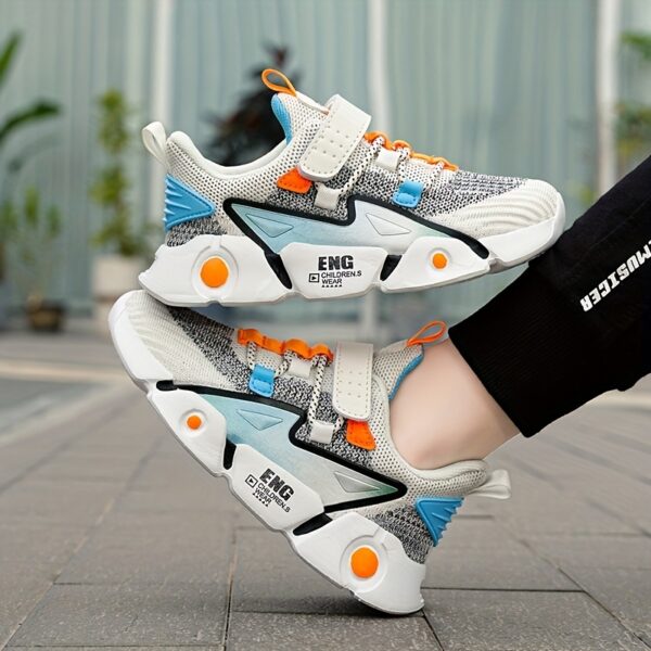 Stylish and breathable Color Block Boys Running Shoes from Newness, perfect for active kids. The shoes feature a vibrant color block design.