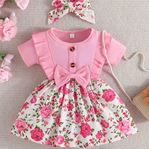 Adorable baby girl wearing a Summer Bloom floral dress, perfect for summer.