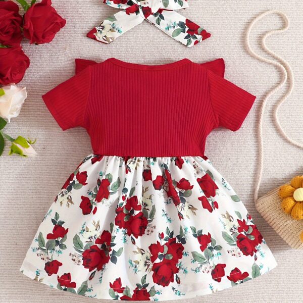 Adorable baby girl wearing a Summer Bloom floral dress, perfect for summer.
