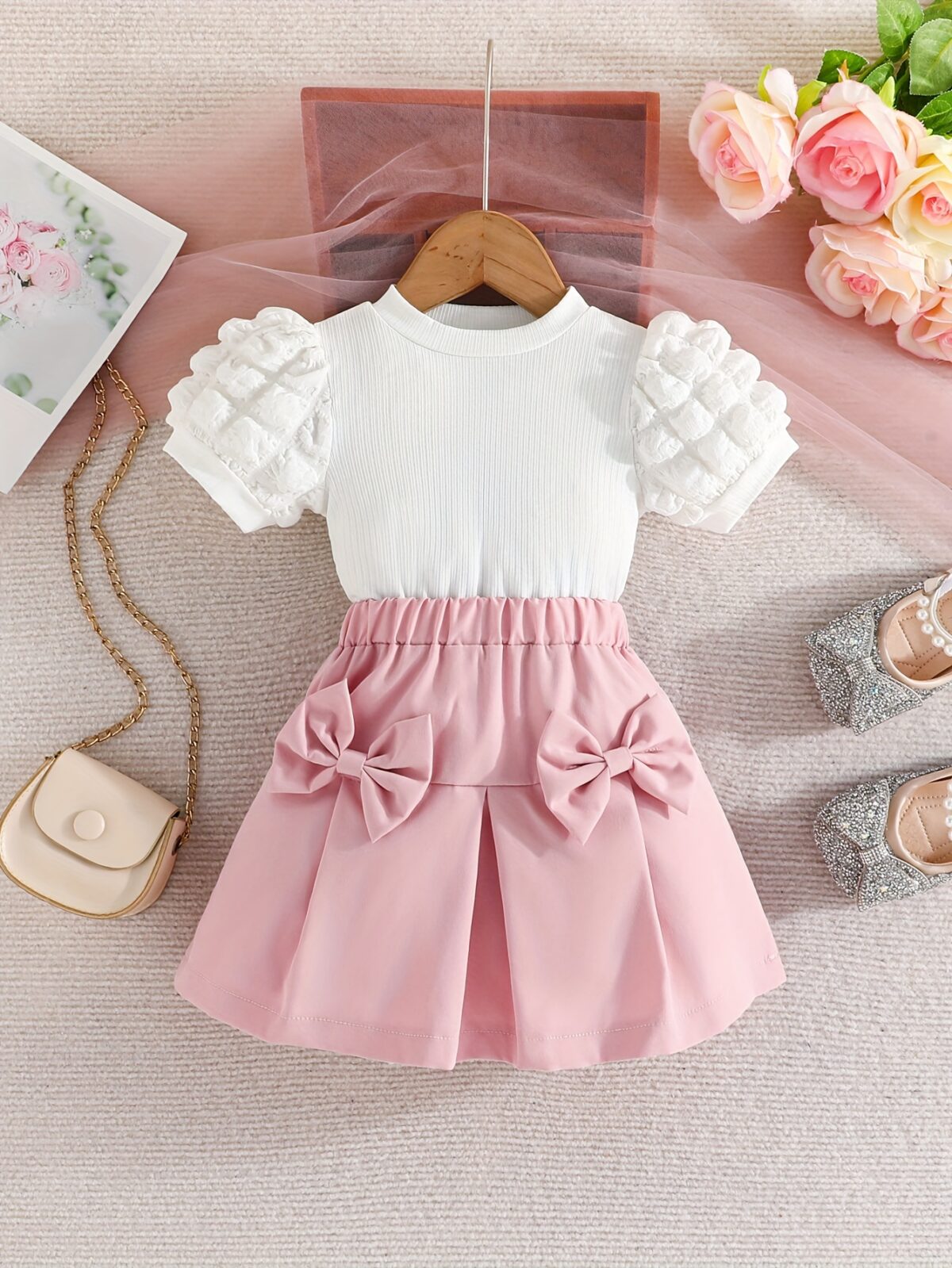 Adorable Pastel Dream Girls Summer Set featuring a pastel colored top and bottom perfect for summer The outfit is shown on a young girl highlighting its comfortable and stylish design