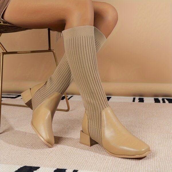 Newness Cosmopolitan Knit Boots in a stylish, casual setting. The image shows the knit texture and comfortable design.