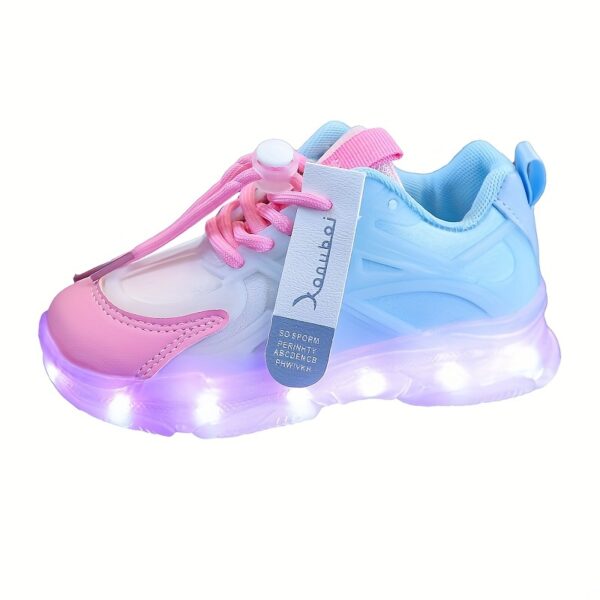 Kids' GUANGLAN Nova Glow Shoes lighting up at night, showcasing their lightweight and durable design. Perfect for nighttime play and adventures!
