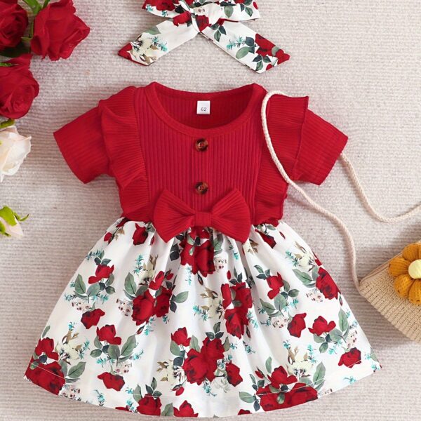 Adorable baby girl wearing a Summer Bloom floral dress, perfect for summer.