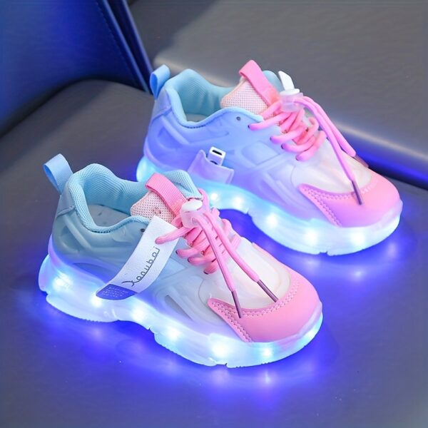 Kids' GUANGLAN Nova Glow Shoes lighting up at night, showcasing their lightweight and durable design. Perfect for nighttime play and adventures!