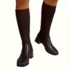 Newness Cosmopolitan Knit Boots in a stylish casual setting The image shows the knit texture and comfortable design