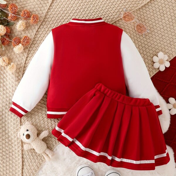 Stylish girls' preppy patchwork baseball jacket and skirt set, perfect for fall and winter. Features a mix of colorful patches on a comfortable jacket and matching skirt.