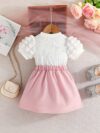 Adorable Pastel Dream Girls Summer Set featuring a pastel colored top and bottom perfect for summer The outfit is shown on a young girl highlighting its comfortable and stylish design