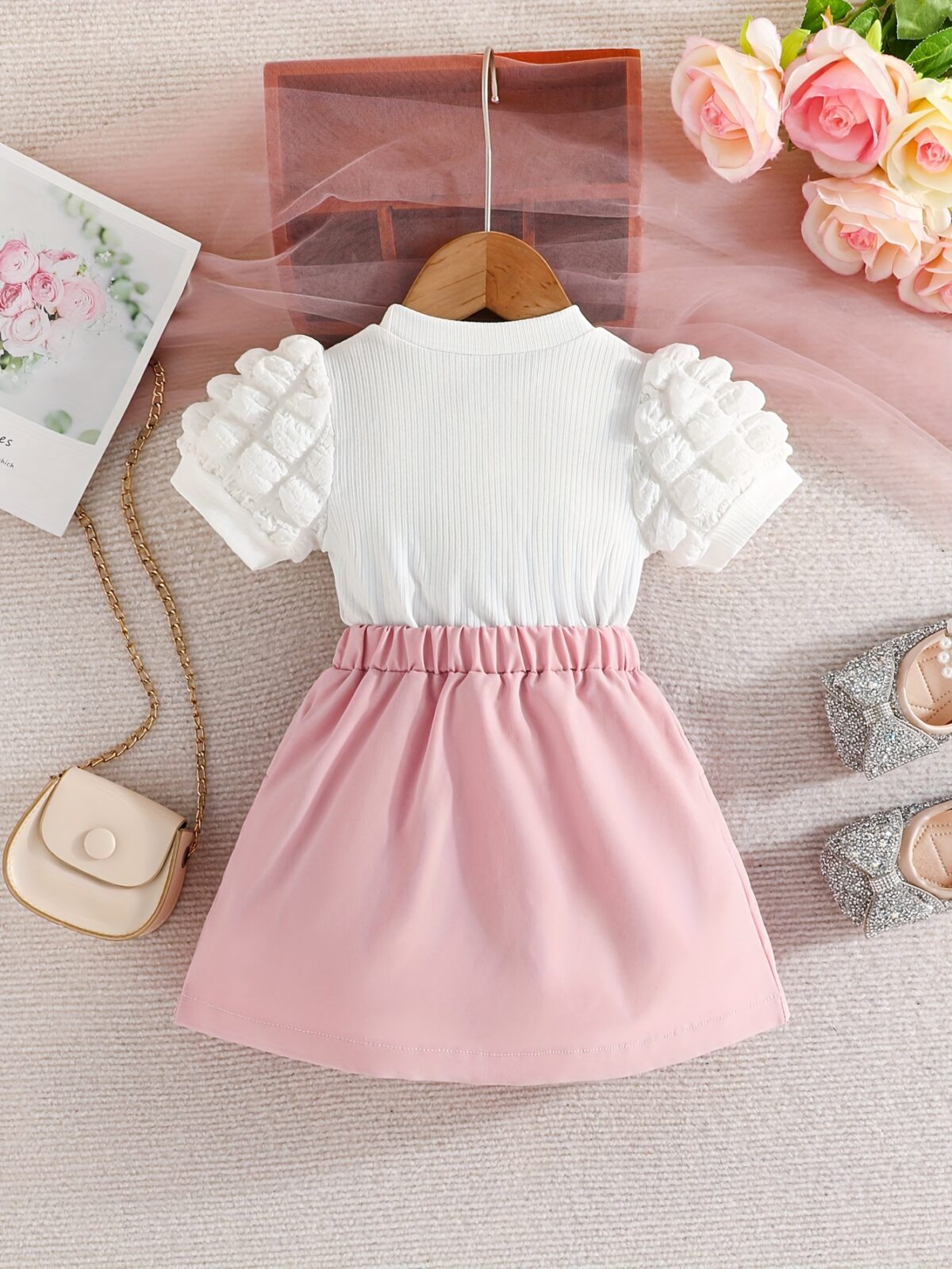 Adorable Pastel Dream Girls Summer Set featuring a pastel colored top and bottom perfect for summer The outfit is shown on a young girl highlighting its comfortable and stylish design