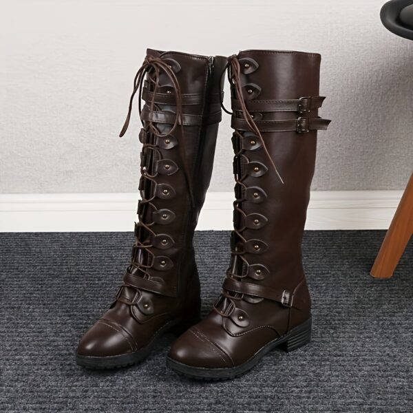 Newness Rebellious Spirit Buckle Knee Boots: Elevate your style with these edgy knee-high boots, featuring a striking buckle detail. Perfect for adding a touch of rebellion to any outfit.