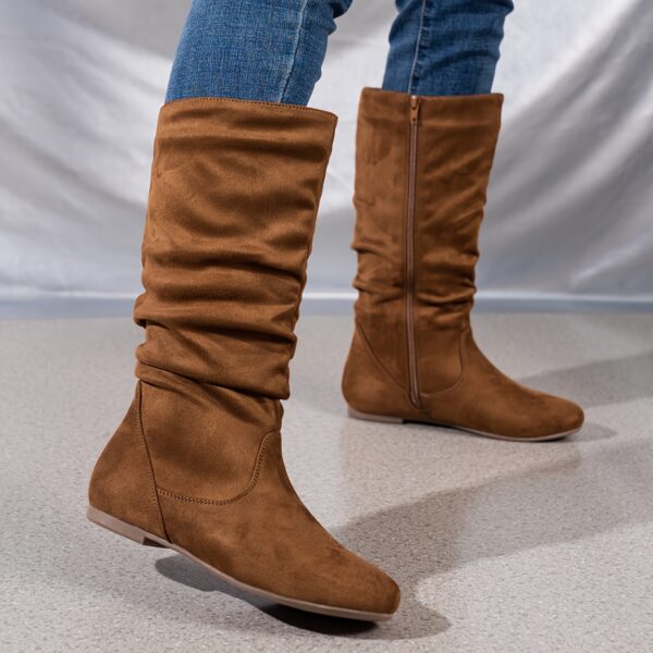 Effortlessly Chic Slouchy Boots in brown leather These stylish boots feature a slouchy fit and sleek design perfect for elevating any outfit