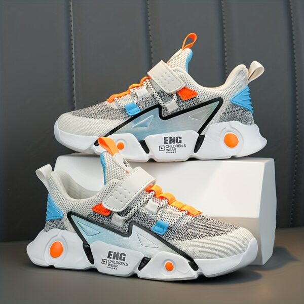 Stylish and breathable Color Block Boys Running Shoes from Newness, perfect for active kids. The shoes feature a vibrant color block design.