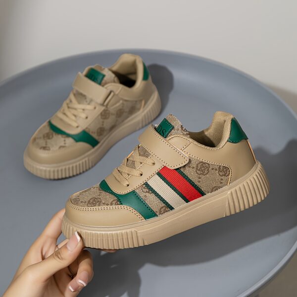 Stylish and vibrant color-block striped kids' sneakers by Newness. Lightweight and durable, perfect for everyday wear.