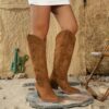 Stylish embroidered cowboy boots from Newness perfect for adding a touch of western flair to any outfit
