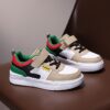 Stylish boys Colorblock Stripe Sneakers by Newness perfect for active kids Featuring a vibrant colorblock design and comfortable striped detailing