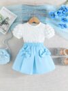 Adorable Pastel Dream Girls Summer Set featuring a pastel colored top and bottom perfect for summer The outfit is shown on a young girl highlighting its comfortable and stylish design