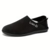 Newness Lian Di Mens Slip On Loafers in navy blue showcasing their breathable design and effortless style Perfect for any occasion