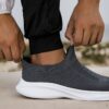 Newness Urban Trek Mens Slip On Sneakers in stylish minimalist design showcasing breathable comfort and effortless style