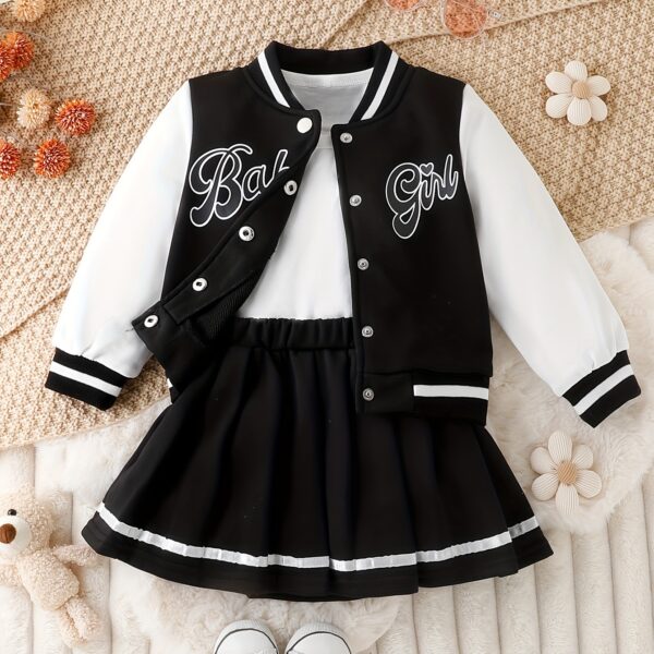Stylish girls' preppy patchwork baseball jacket and skirt set, perfect for fall and winter. Features a mix of colorful patches on a comfortable jacket and matching skirt.