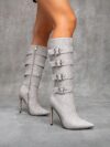 Newness Ascension Stiletto Buckle Boots Elevate your look with these stunning stiletto boots featuring a chic buckle detail