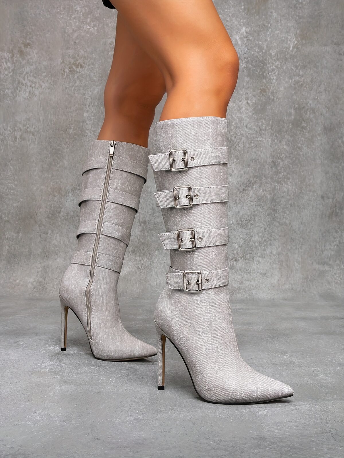 Newness Ascension Stiletto Buckle Boots Elevate your look with these stunning stiletto boots featuring a chic buckle detail