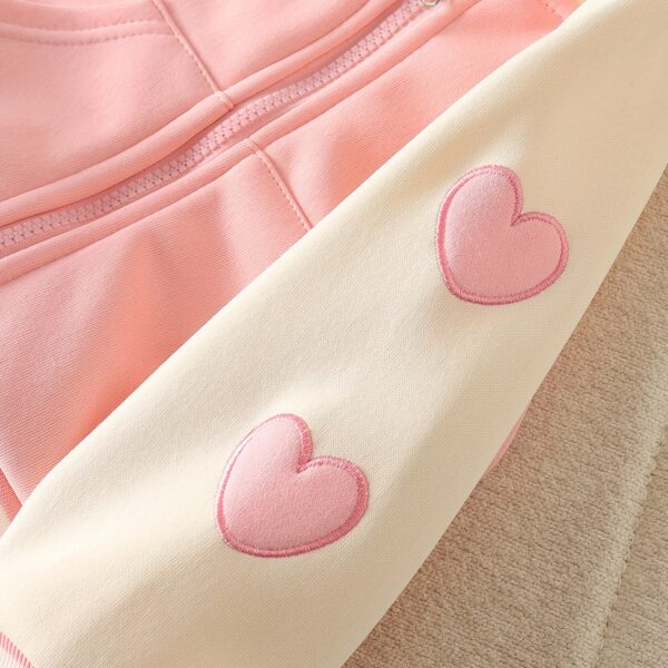 Adorable Spring Blossom Girls' Tracksuit, perfect for outdoor play. A charming pink and floral tracksuit, ideal for spring and summer.