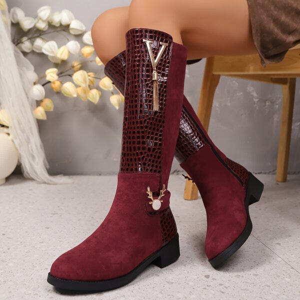Newness Crimson V Chain Burgundy Knee Boots Elevate your style with these luxurious burgundy knee high boots featuring a striking V chain detail