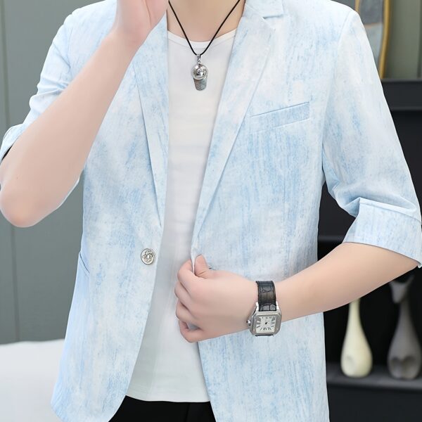 The Newness Dubai Breeze Men's Summer Blazer in a stylish pose on a model.