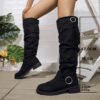Newness Slouchy Knee High Boots in brown leather showcasing a chic and casual style perfect for winter The boots are slouchy and knee high highlighting their comfortable and fashionable design
