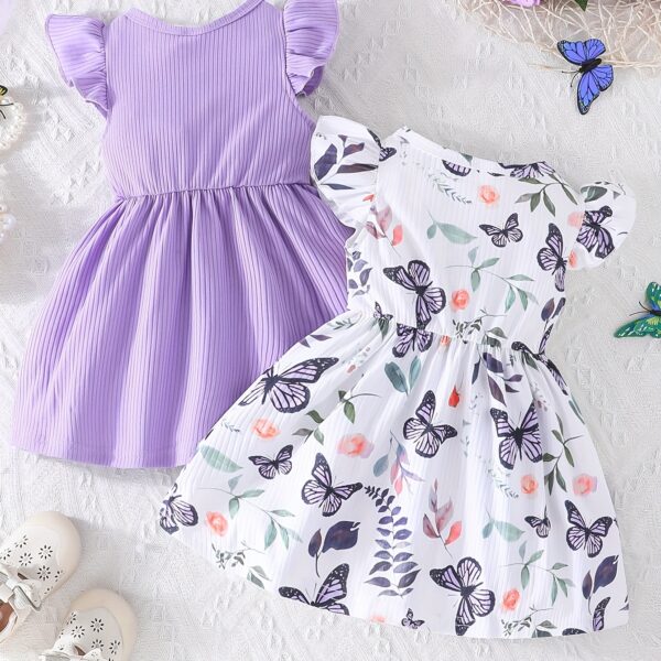 Adorable Summer Bloom Baby Girl Dress Set: A charming two-piece outfit in soft, summery colors, perfect for warm weather.