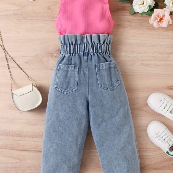 Adorable girls denim set from Newness, perfect for spring, summer, or fall. Features a stylish design and comfortable fit.