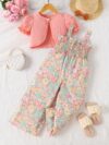 Adorable child wearing Newnesss Summer Bloom Floral Jumpsuit a boho chic floral jumpsuit perfect for sunny days
