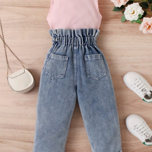 Adorable girls denim set from Newness, perfect for spring, summer, or fall. Features a stylish design and comfortable fit.