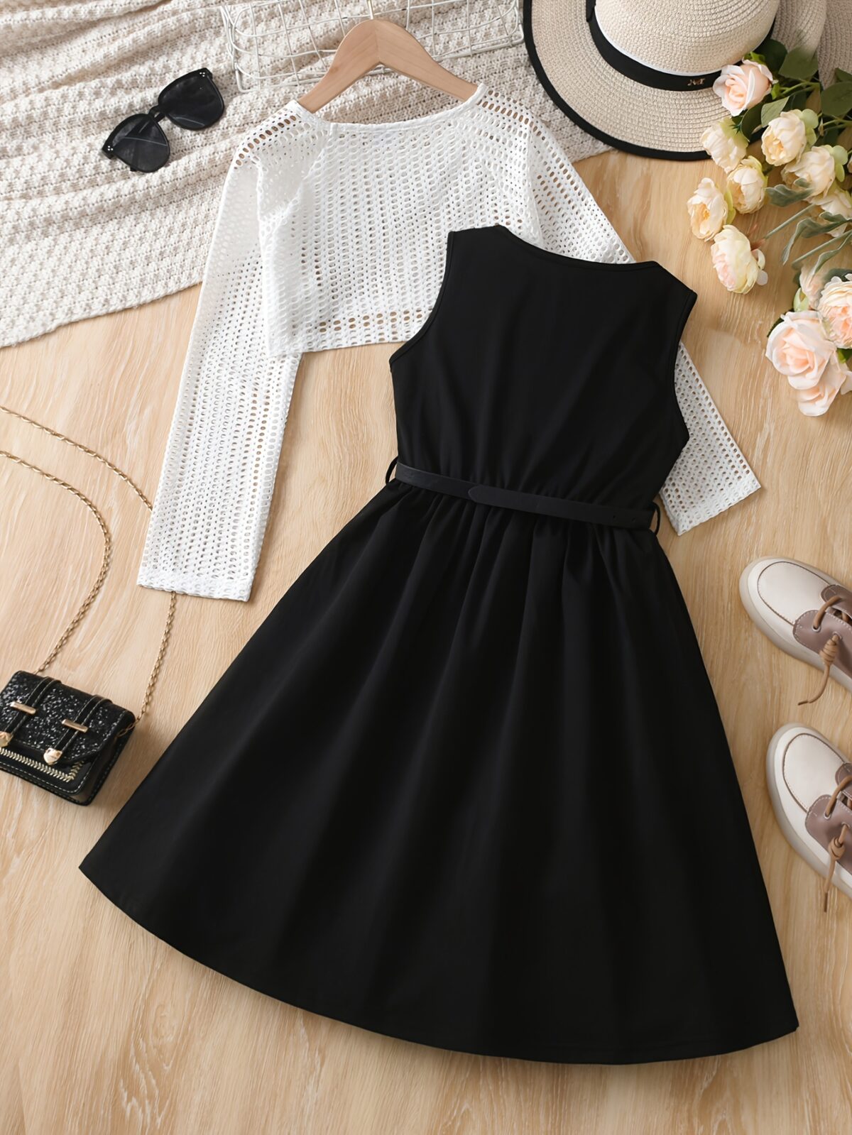 Adorable girls summer dress set from Newness featuring a stylish top and skirt perfect for warm weather