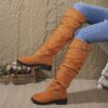 Newness Slouchy Knee High Boots in brown leather showcasing a chic and casual style perfect for winter The boots are slouchy and knee high highlighting their comfortable and fashionable design