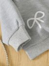 Adorable girls Playful Days Bow Embroidered Set perfect for fall and winter Featuring delicate bow embroidery this outfit is ideal for playful days