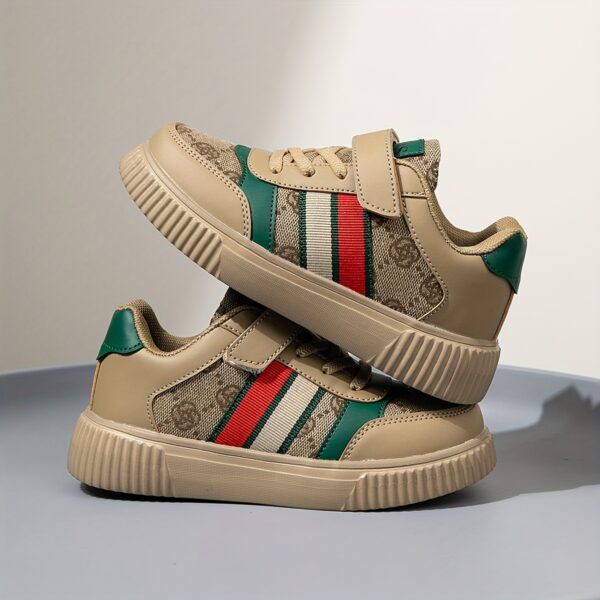 Stylish and vibrant color-block striped kids' sneakers by Newness. Lightweight and durable, perfect for everyday wear.