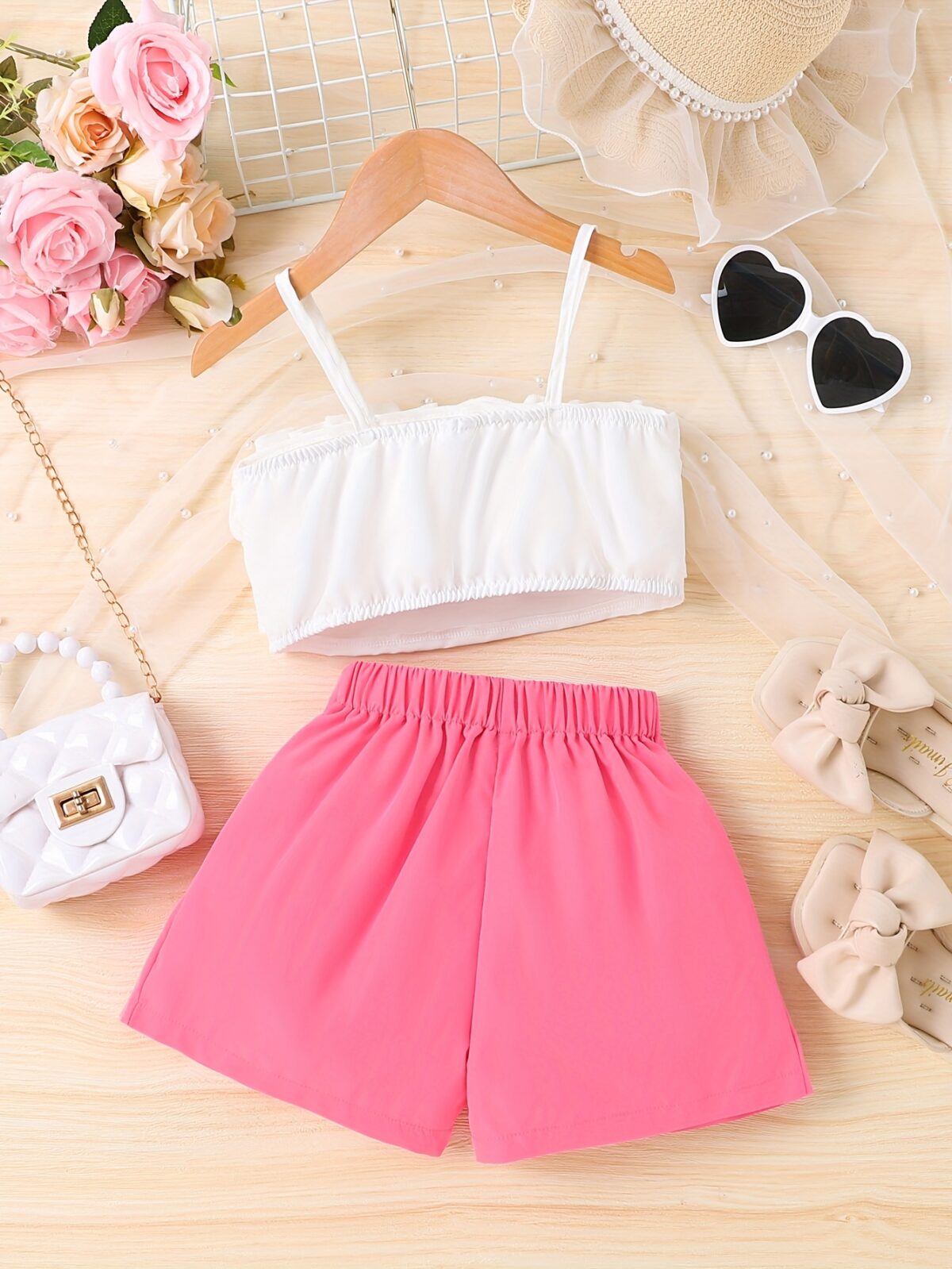 Adorable Summer Bloom Girls Shorts Set in a cheerful floral print perfect for sunny summer days The set includes a top and shorts