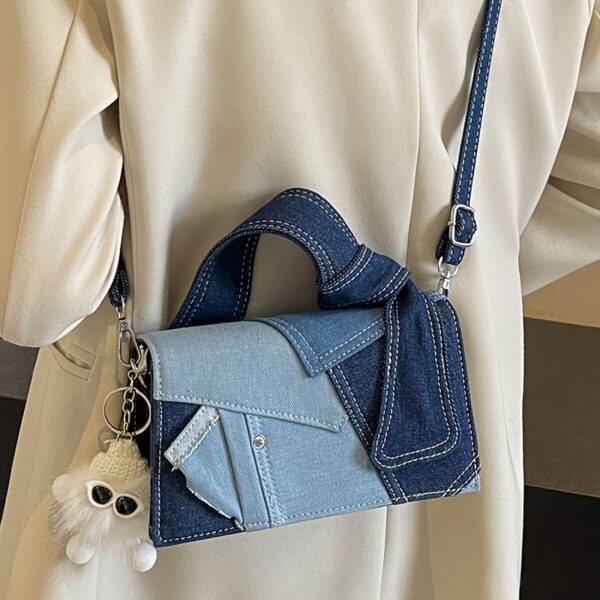 Newness Nomad Two-Tone Denim Crossbody bag, stylish and durable everyday denim crossbody bag in two tone denim, shown against a neutral background.