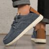 Newness Mens Effortless Style Fabric Loafers Breathable lightweight and effortlessly stylish loafers perfect for everyday wear Close up view showcasing the fabric texture and design