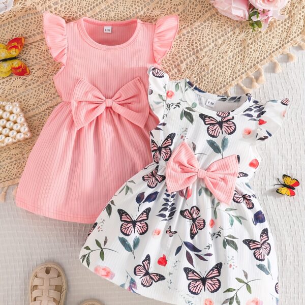 Adorable Summer Bloom Baby Girl Dress Set: A charming two-piece outfit in soft, summery colors, perfect for warm weather.