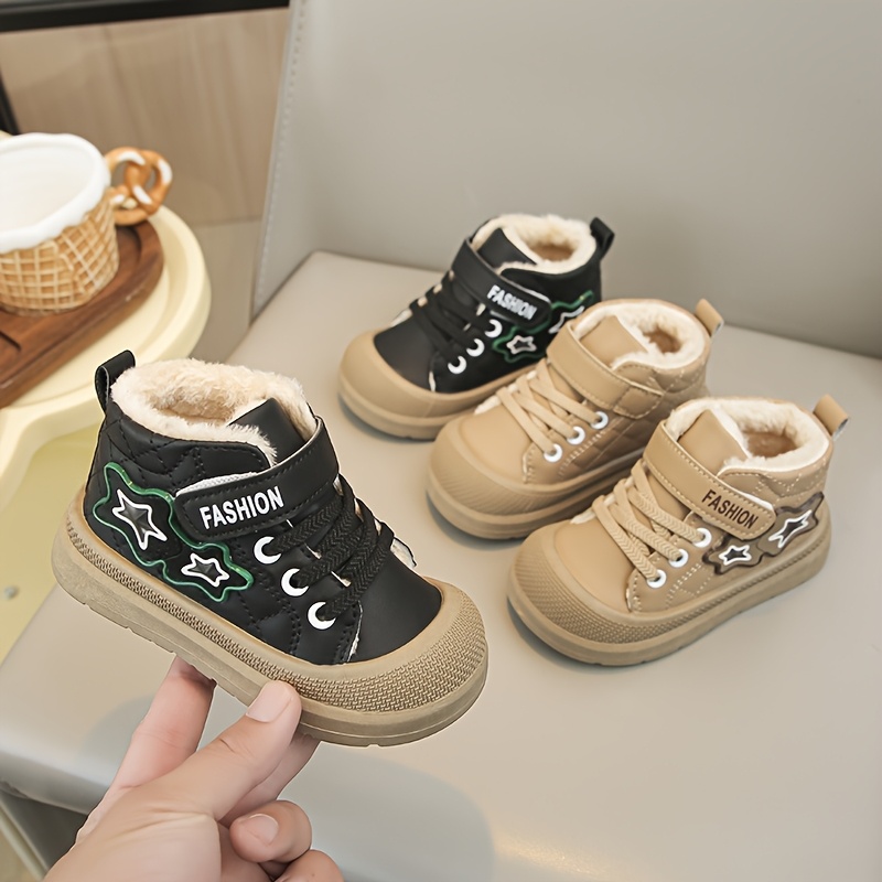 Kids' Newness CozyStep Winter Snow Boots featuring plush lining and non-slip sole, perfect for snowy adventures.